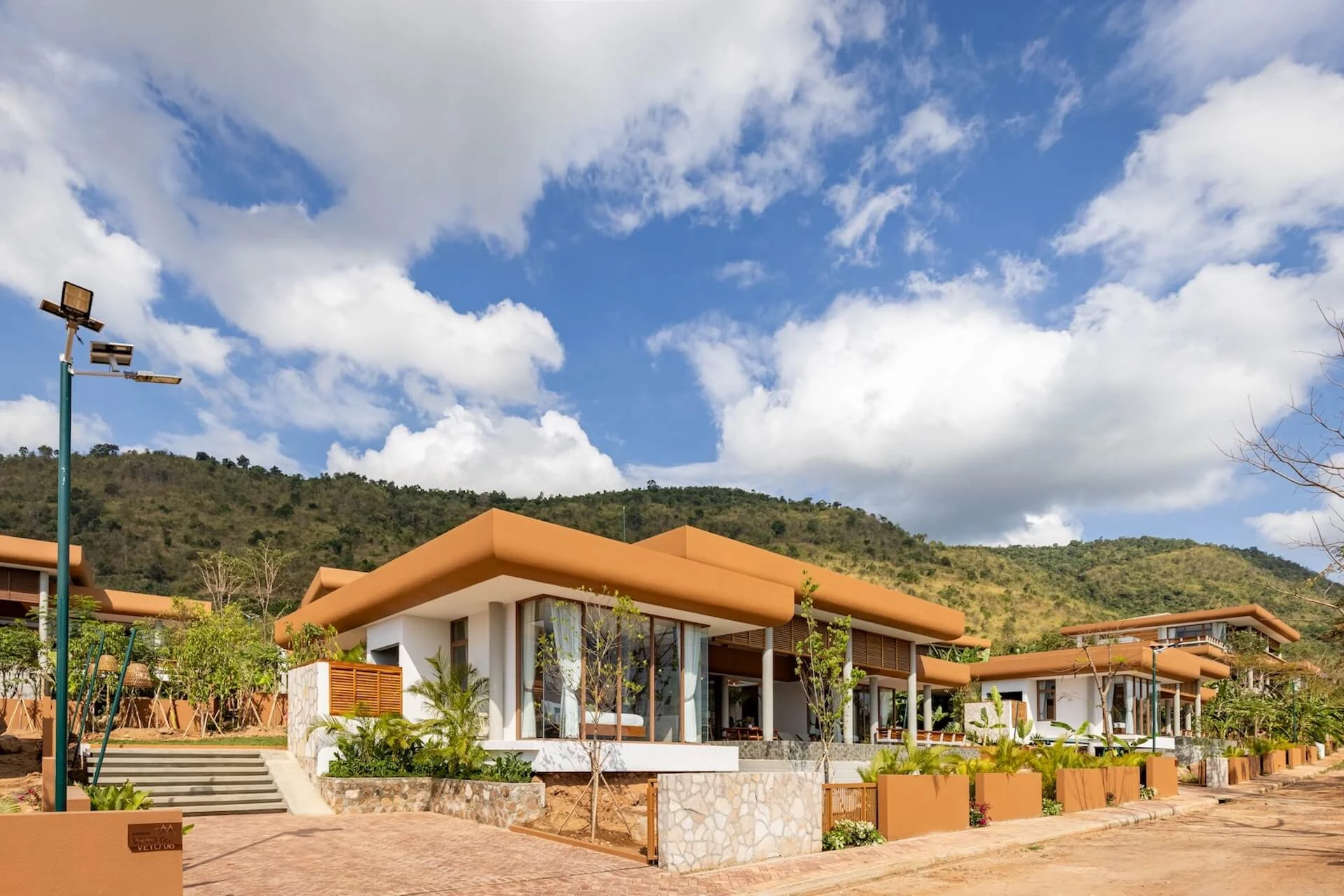 Completed Amaya Kampot villas on a hillside in Kampot Province