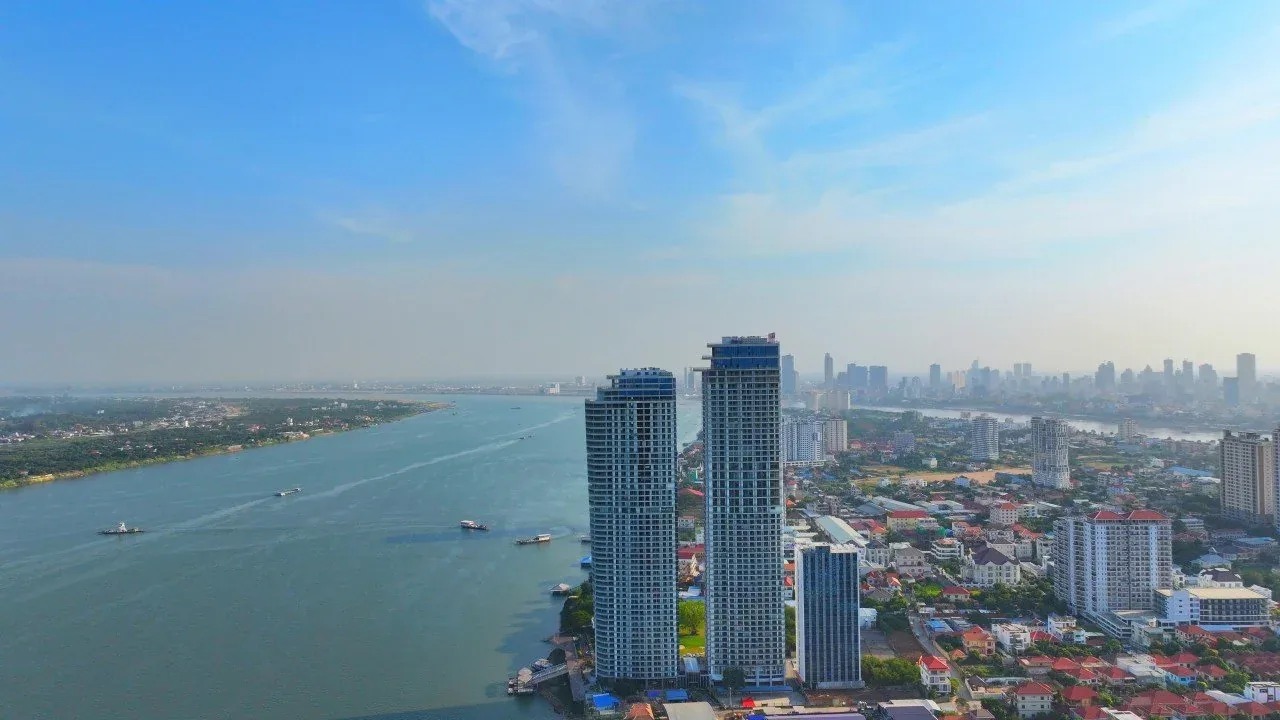Completed Morgan EnMaison towers beside the Mekong River in Phnom Penh